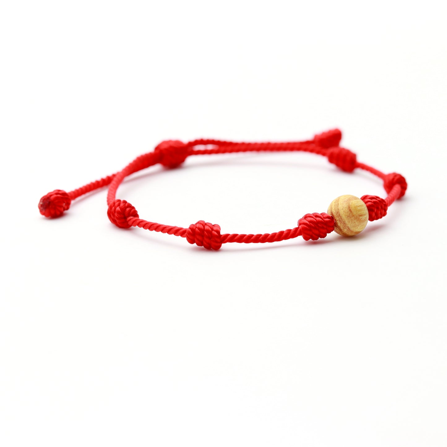 PULSERA 7 NUDOS CON CUENTA DE PALO SANTO (8 mm.)