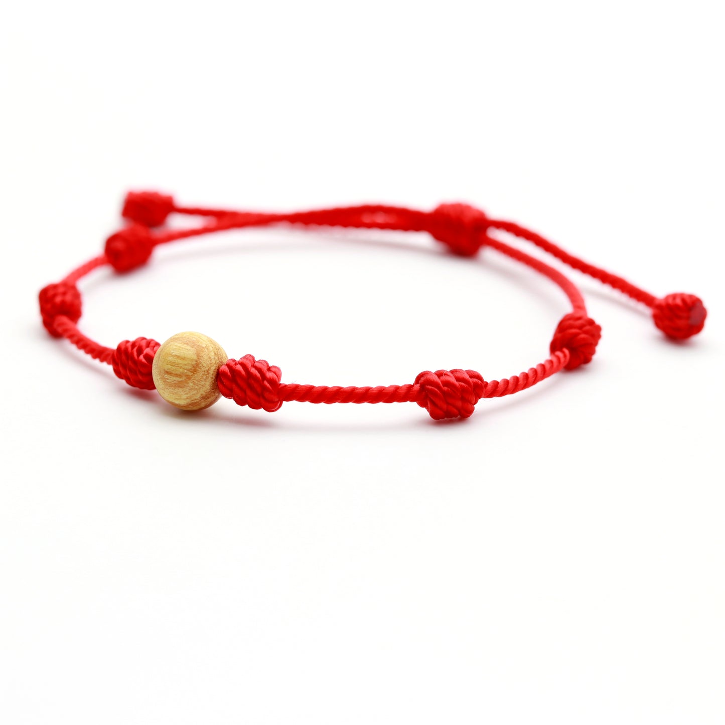PULSERA 7 NUDOS CON CUENTA DE PALO SANTO (8 mm.)