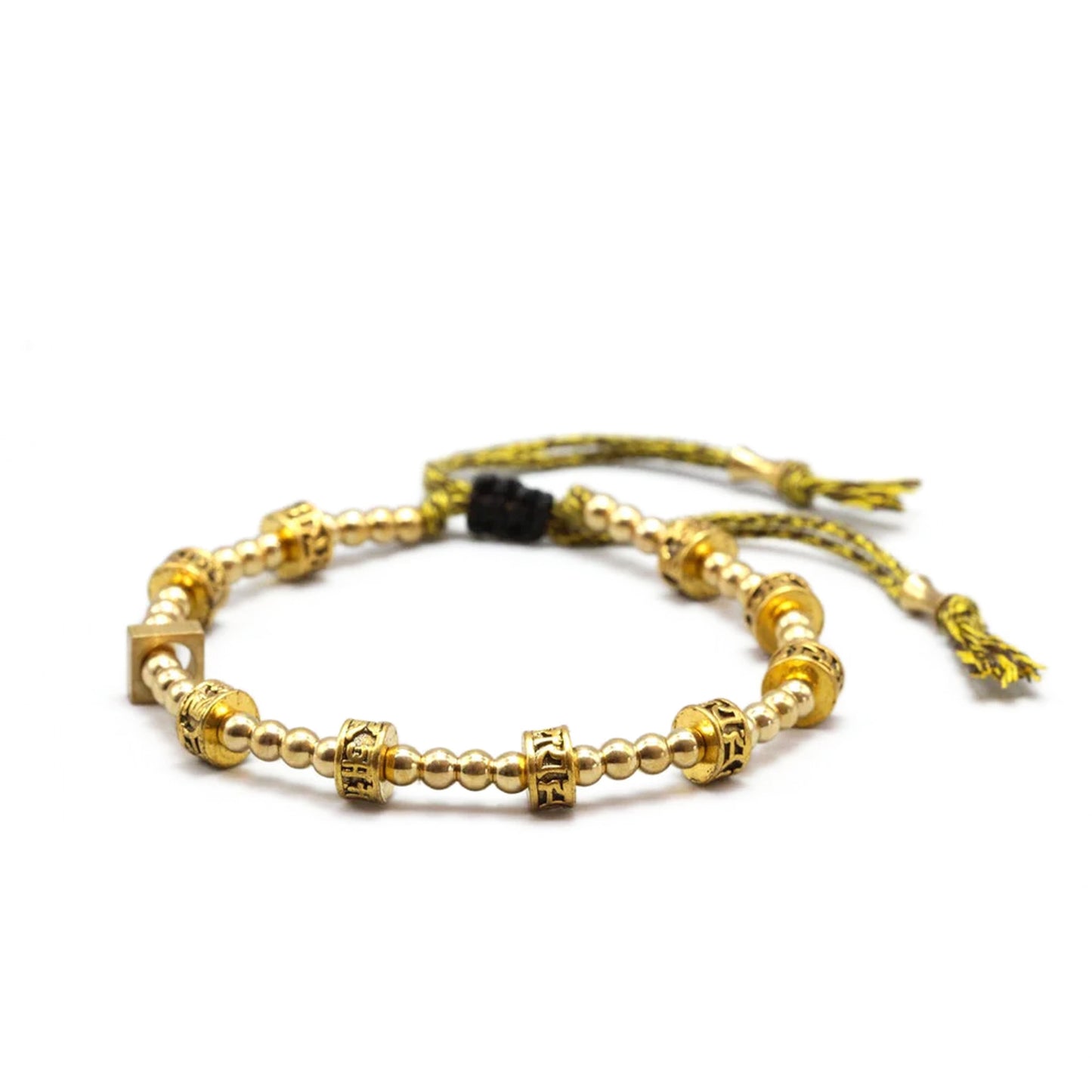 CUENTAS DE LATÓN - Pulsera tibetana artesanal con el mantra: "Om Mani Padme Hum"