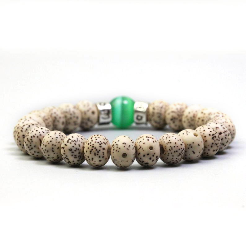 CUENTAS DE SEMILLAS DE BODHI CON CUENTA DE OJO DE GATO - Pulsera tibetana artesanal con cuentas de Bodhi Xingyue talladas a mano