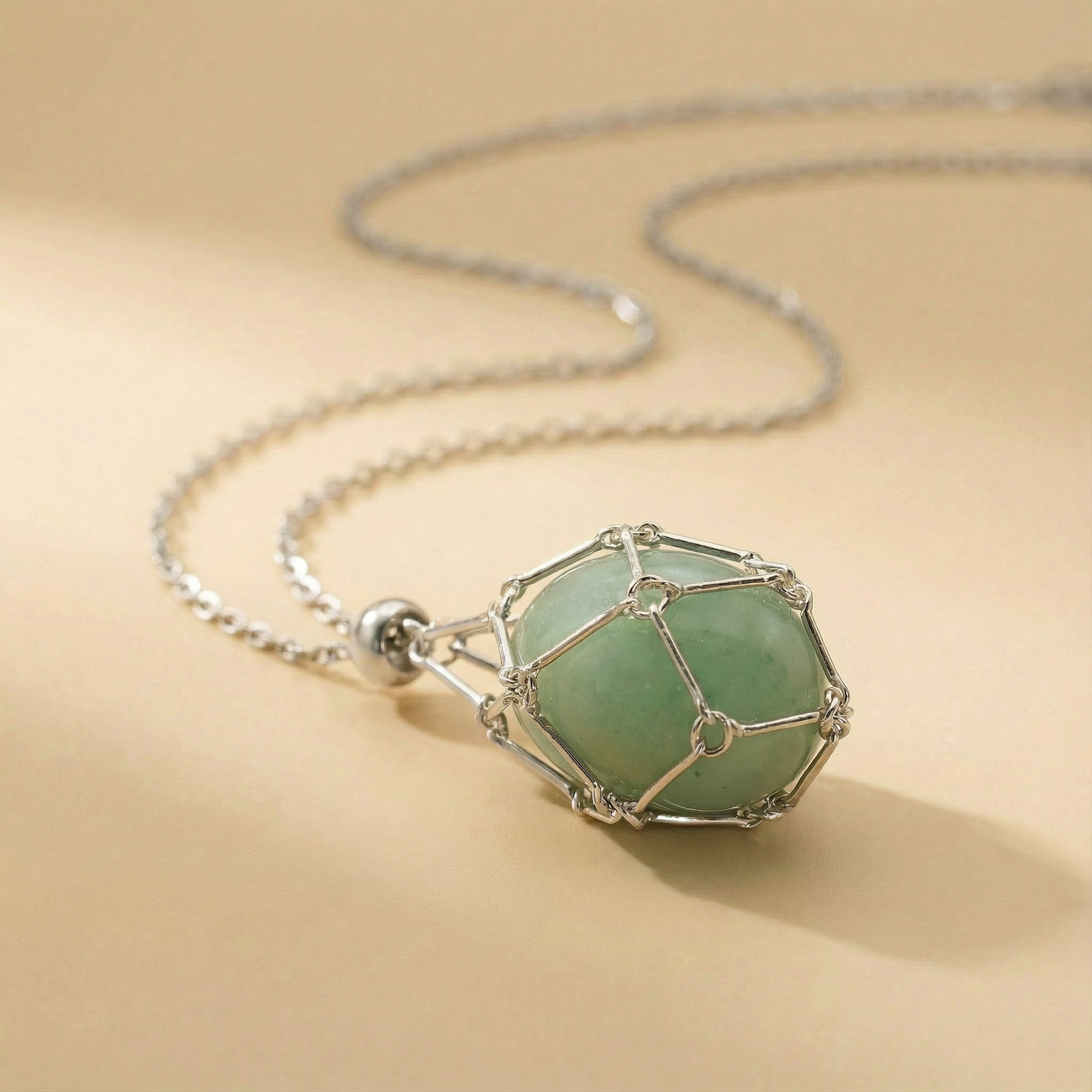 Colgante piedra natural en Jaula | Diseño Geométrico Minimalista de Acero Inoxidable