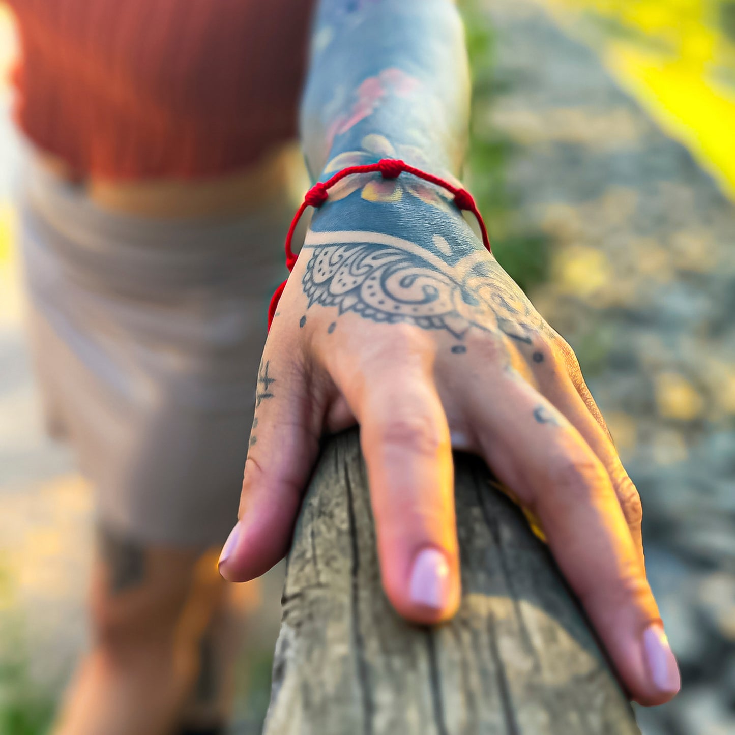 Pulsera roja 7 nudos