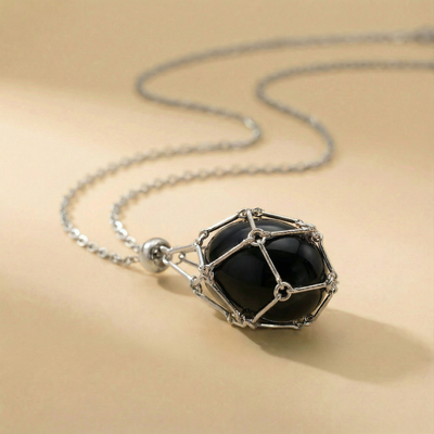 Colgante piedra natural en Jaula | Diseño Geométrico Minimalista de Acero Inoxidable