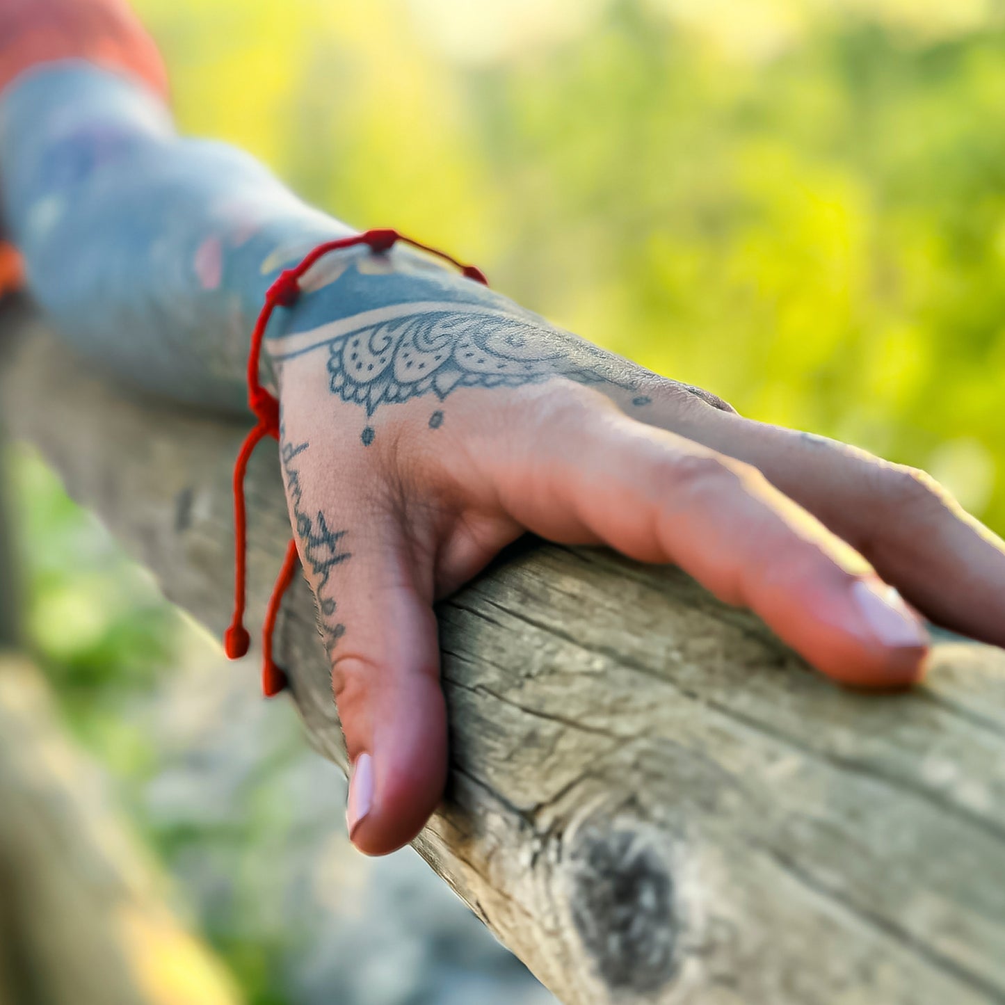 Pulsera roja 7 nudos