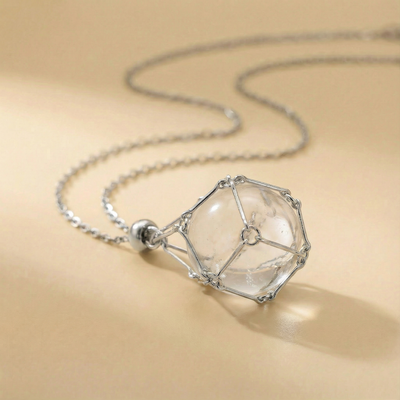 Colgante piedra natural en Jaula | Diseño Geométrico Minimalista de Acero Inoxidable