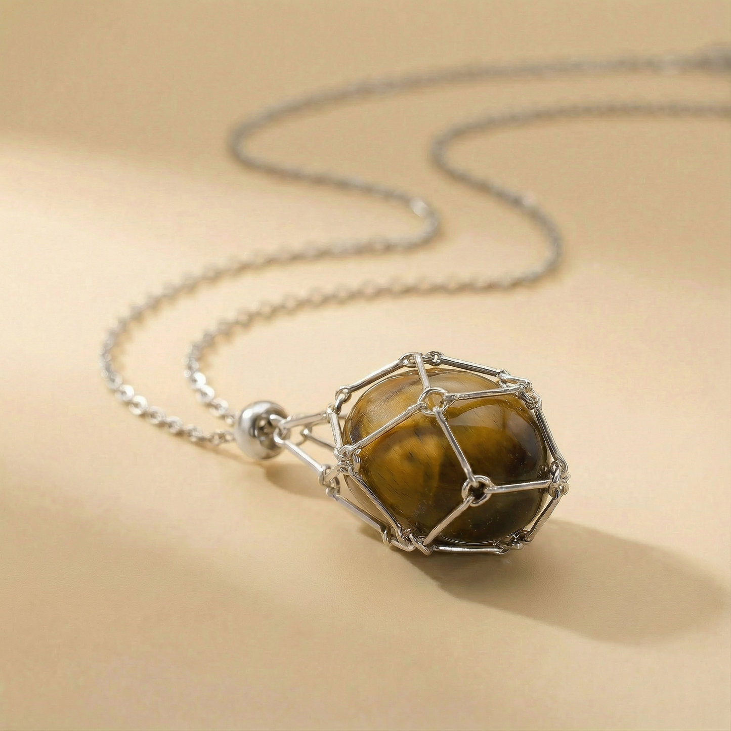 Colgante piedra natural en Jaula | Diseño Geométrico Minimalista de Acero Inoxidable