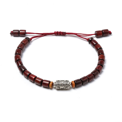 CUENTAS DE MADERA (CAOBA) Y CHARM PLATA TIBETANA - Pulsera tibetana artesanal con texto: "Om mani padme hum"