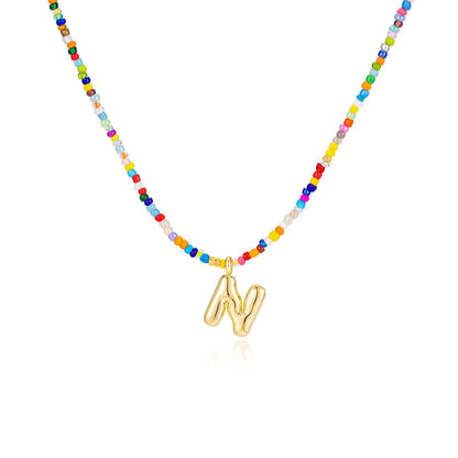 Colgante Inicial multicolor | Baño de Oro 18K y Personalizado Hecho a Mano