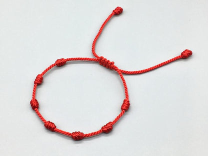 Pulsera roja 7 nudos