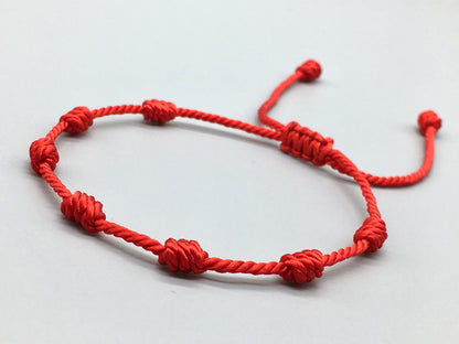 Pulsera roja 7 nudos